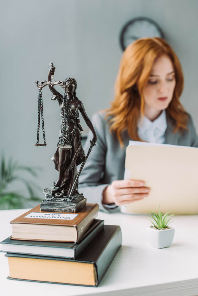 female lawyer looking at files